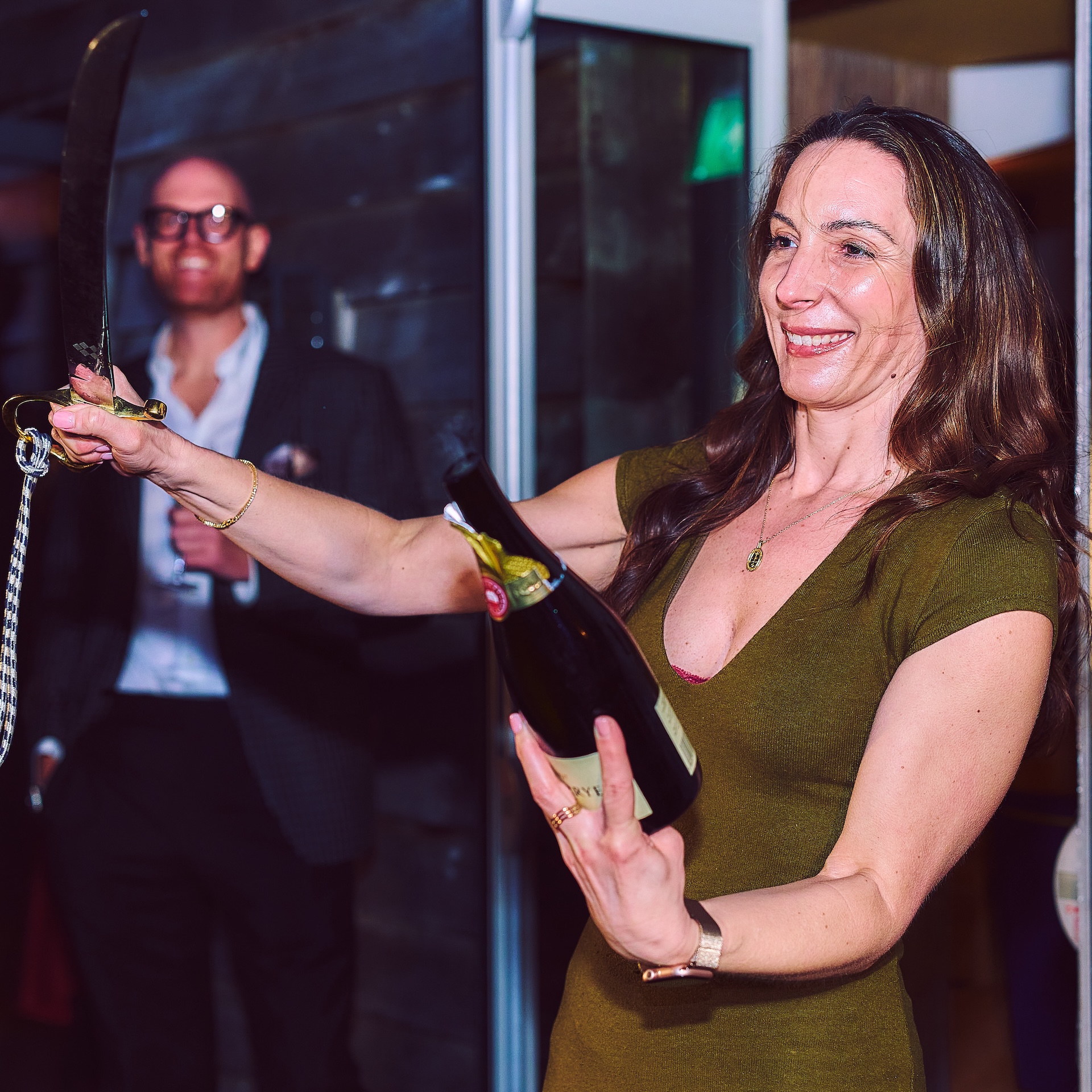 Member performing sabrage at a Silver Sword event